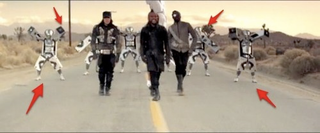 Illustration for article titled Black Eyed Peas New Music Video: We're Not Robots, We're Just Awful